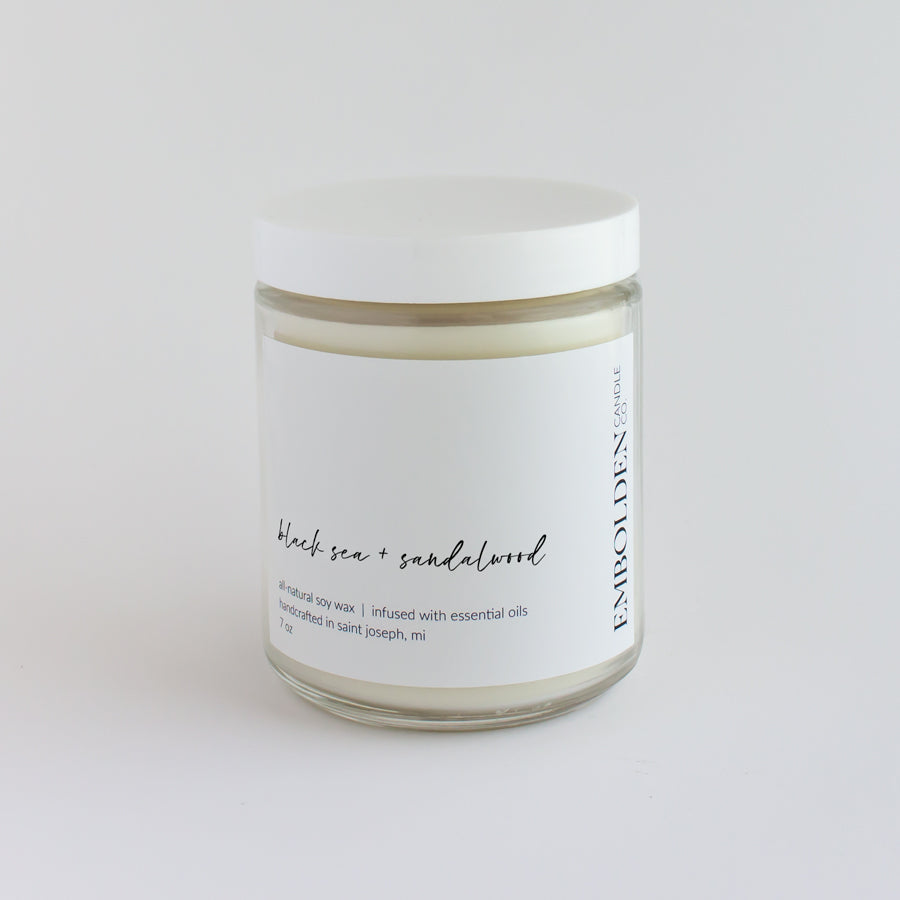 Black Sea and Sandalwood candle in a clean-burning soy wax blend, creating a tranquil ambiance.